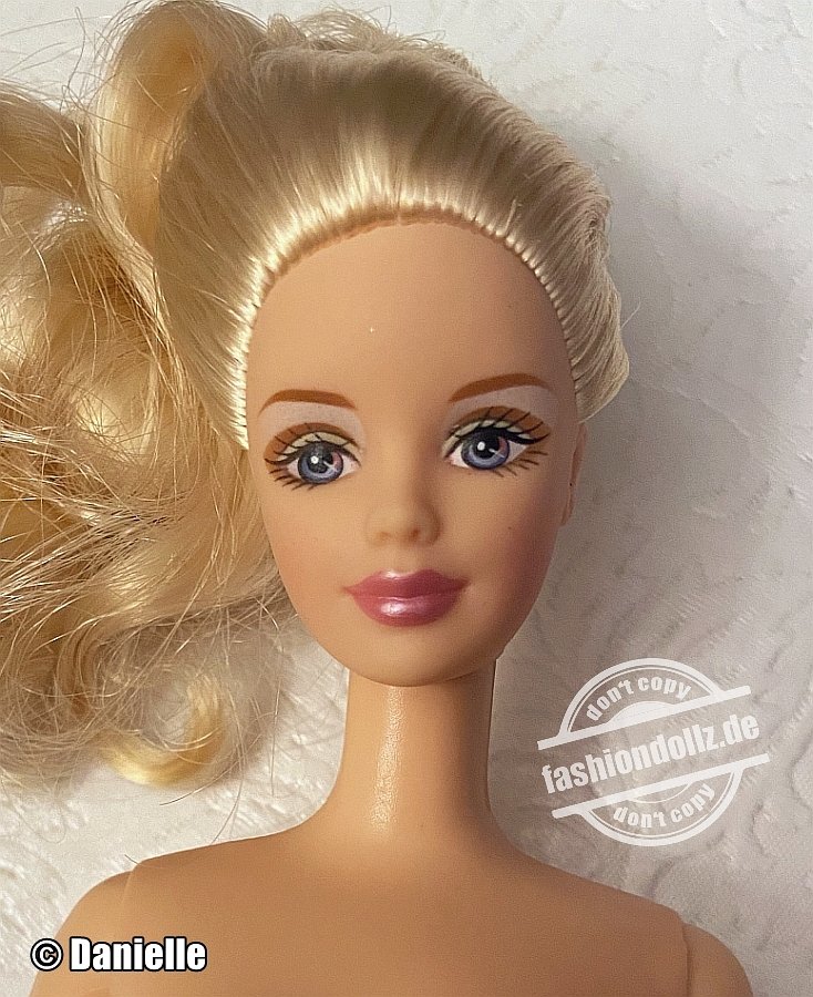 2002 Winter’s Reflection Barbie, blonde #55682 Avon Exclusive